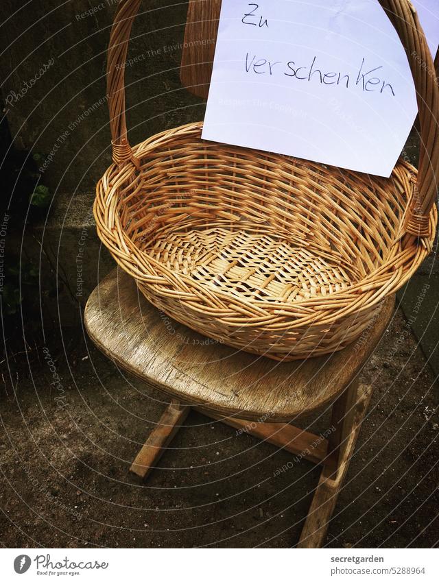 Without value. give away Gift Street Chair free of charge Free of charge Free-of-charge Signage Signs and labeling Colour photo White Text cursive Basket