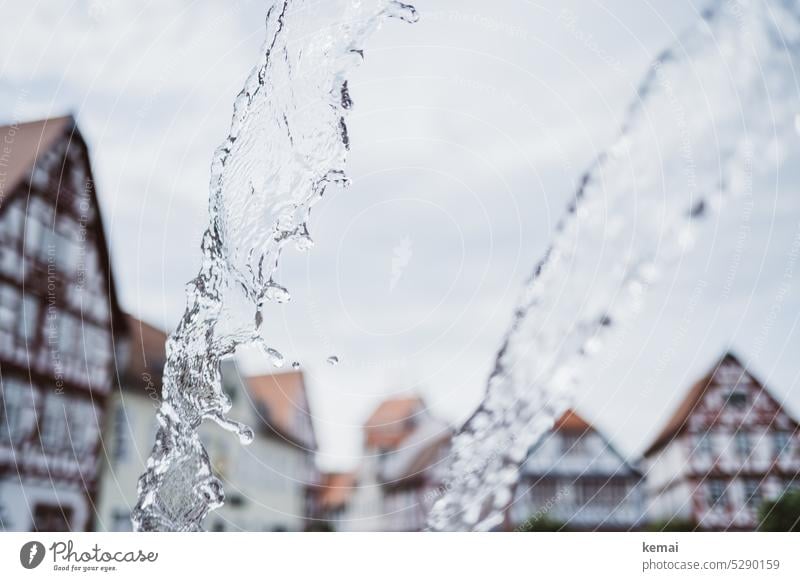 Mainfux | Fountain water and houses Water Well Town Flow well water House (Residential Structure) half-timbered Half-timbered house Wet Splash of water Inject