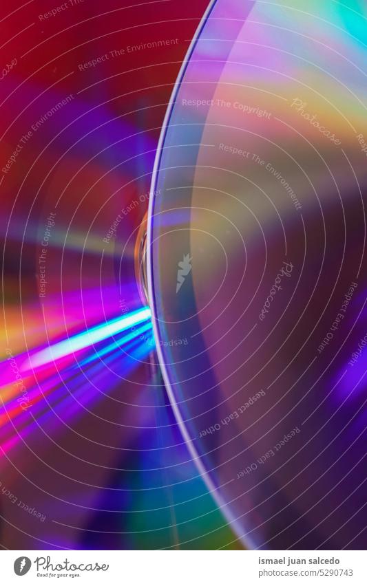 colorful neon lights backgrond, compact disc reflection rays rays of light laser colors red red background red color blue bokeh design art gradient digital