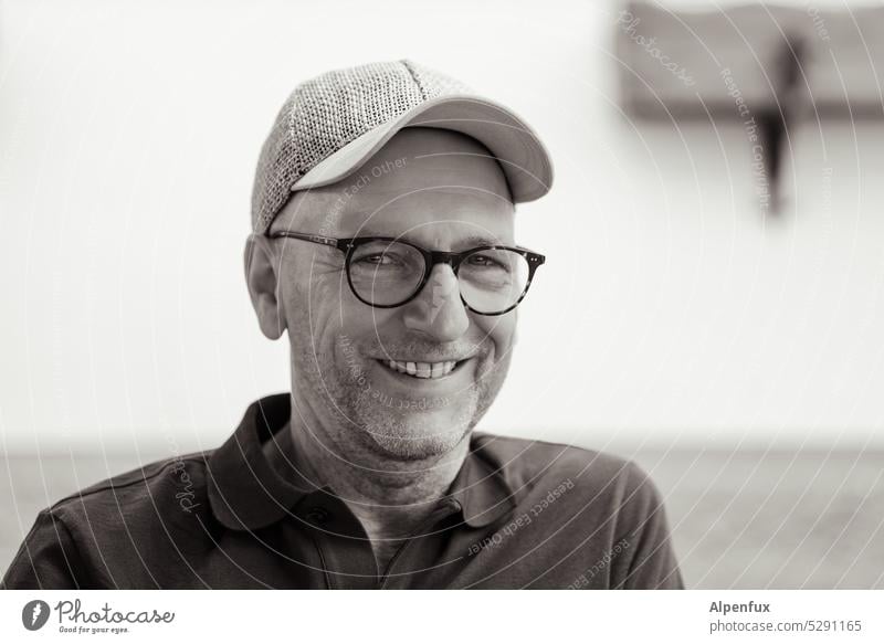 MainFux | laughing man Man Laughter Smiling Masculine Human being Eyeglasses Cap more adult portrait Face Joy Happiness Looking into the camera Contentment