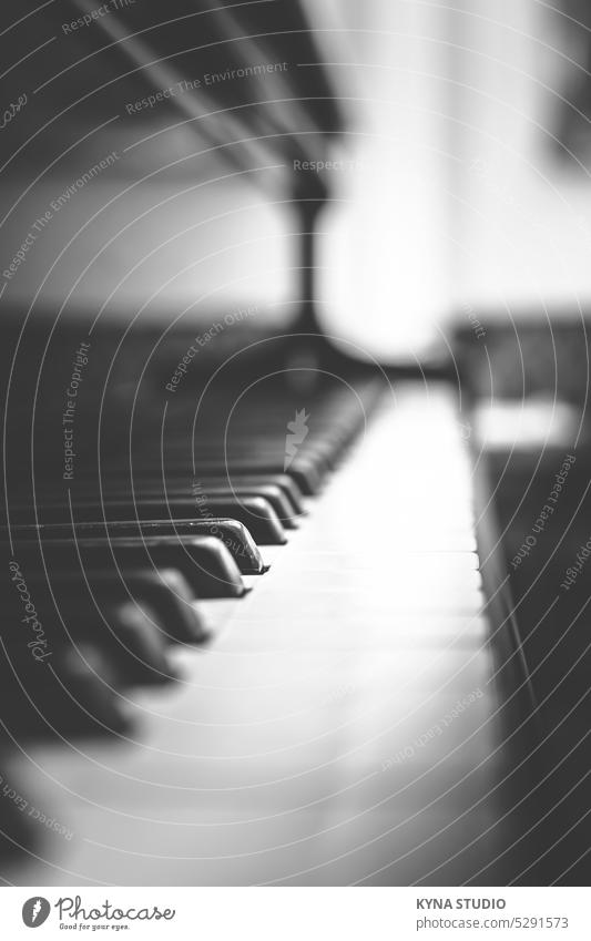 Piano background blurred grey gray bokeh bar pianist symphony skill performer lesson melody compose play harmony jazz detail note tone vertical grand old