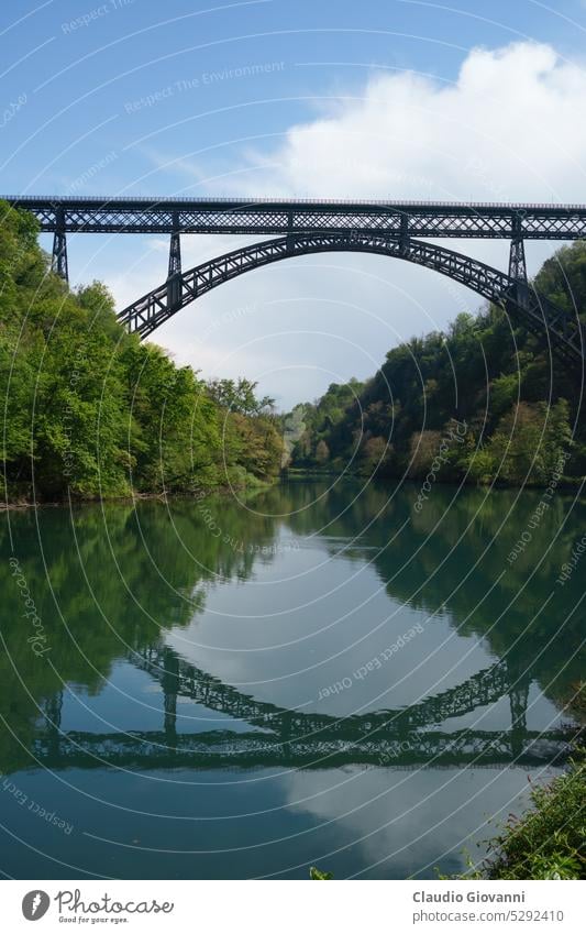 Iron bridge over Adda river at Paderno April Europe Italy Lombardy Milan color cycleway day green iron landscape nature photography plant reflection spring