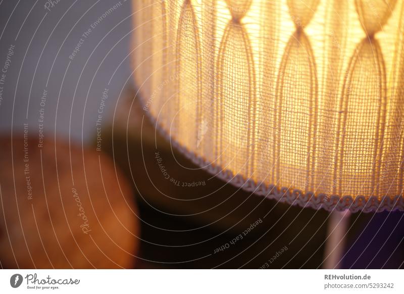Detail of a retro-style lamp Lampshade Retro petrol threads Woven Structures and shapes structures background macro Close-up Border Light Illuminate light on