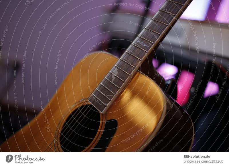 gun barrel Guitar tool Leisure and hobbies Music Sound tones Noises purple Atmosphere Musical instrument Detail Art String instrument Close-up Tone Concert