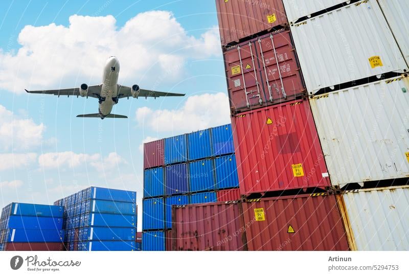Cargo airplane flying above logistic container. Air logistic. Cargo and shipping business. Container ship for import and export logistic. Logistic industry. Container at harbor. Merchandise export.