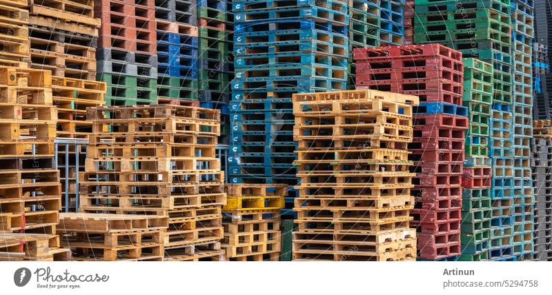 Stack of wooden pallet. Industrial wood pallet at factory warehouse. Cargo and shipping concept. Sustainability of supply chains. Eco-friendly nature and sustainable properties. Renewable wood pallet.