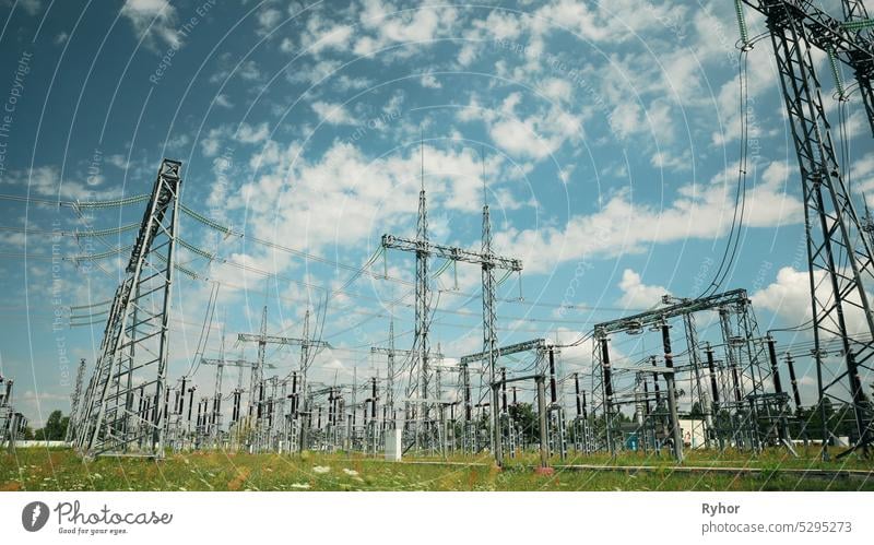 Power Grid Station. Electrical Distribution Station, Transformers, High-voltage Lines In Sunny Summer Day. station clouds current engine communication energy