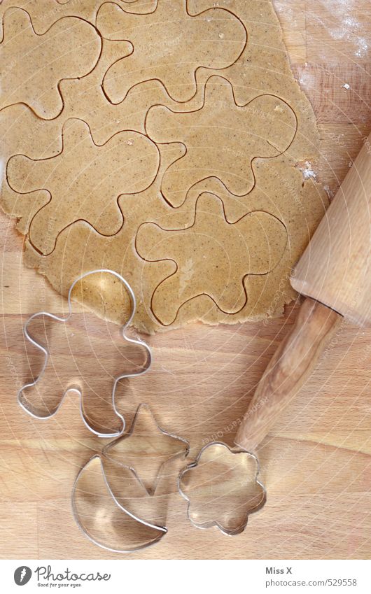 gingerbread pattern Food Dough Baked goods Candy Nutrition Delicious Sweet Cookie Rolling pin Wooden table Baking tin Christmas biscuit Flour Gingerbread Man