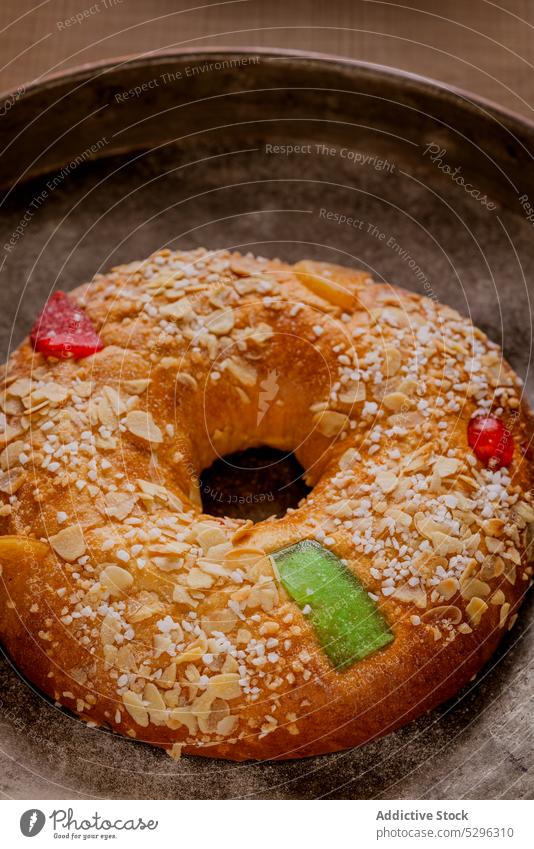 Roscon de Reyes, a typical spanish christmas cake sweet food celebration dessert traditional roscon homemade baked rosca holiday reyes bakery delicious sugar