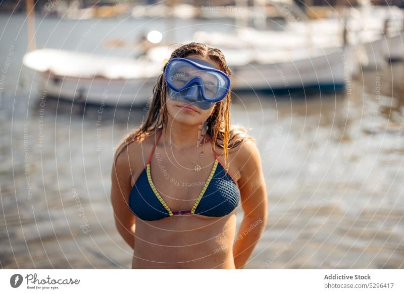 Woman in goggles diving in port woman diver relax summer weekend cadaques beach female spain girona swimmer snorkel hobby adventure freedom tourism travel ocean