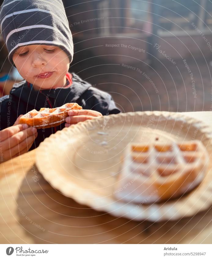 Hm ... yummy | child enjoys a waffle with powdered sugar Child Infancy Waffle Eating Confectioner`s sugar cute Delicious To enjoy Nutrition Dough Baked goods