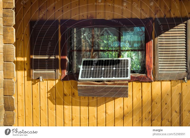 Solar panel on the window Technology photovoltaics Electricity Energy Window Wooden house Gardenhouse House (Residential Structure) Window box technology