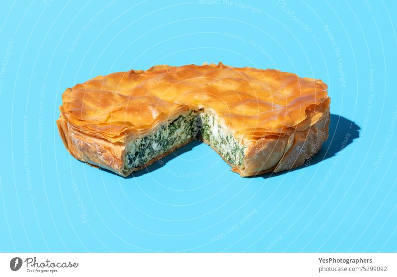 Phyllo cake with spinach and feta cheese, isolated on a blue background. baked balkan banitsa bosnian bright bulgarian color cuisine culture delicious dinner