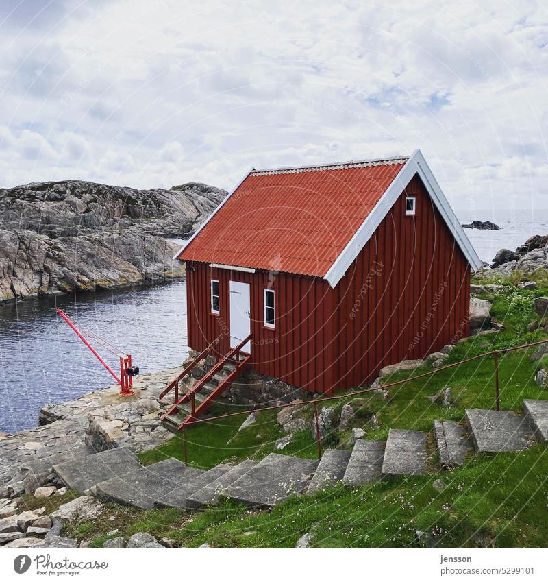 Red wooden house on an archipelago island Wooden house Stairs Stone steps Skerry Norway Water coast Scandinavia Vacation & Travel Sky Rock Ocean Europe
