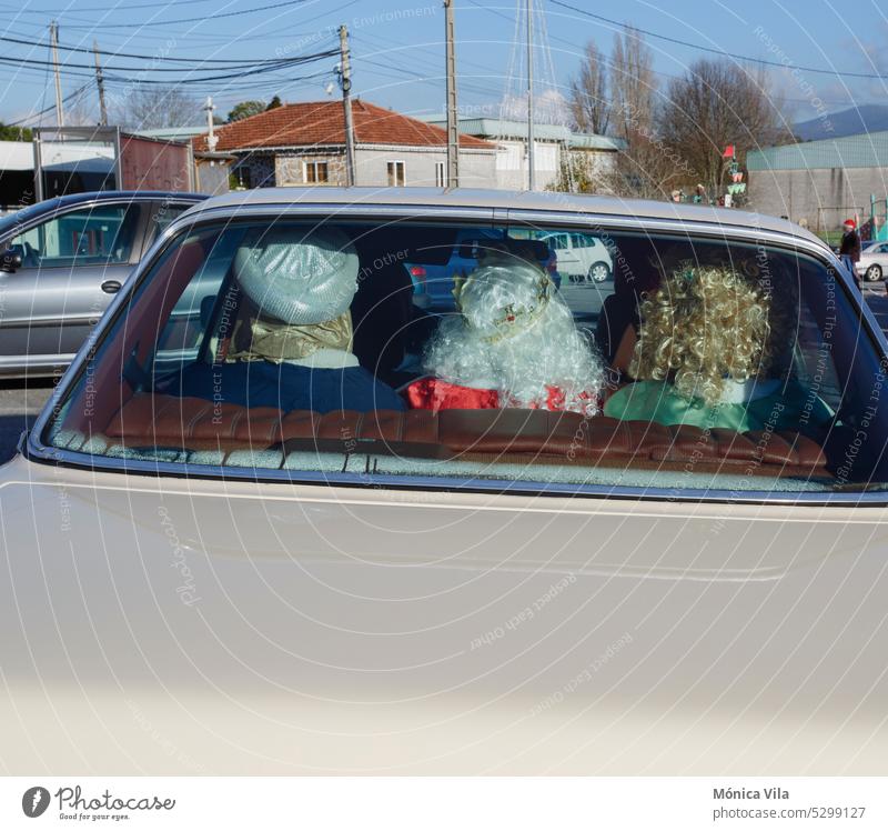 The three Wise Men from the East travel in a white car on Three Kings Day. Christmas christmas kings magi illusion tradition trip three kings day gifts children