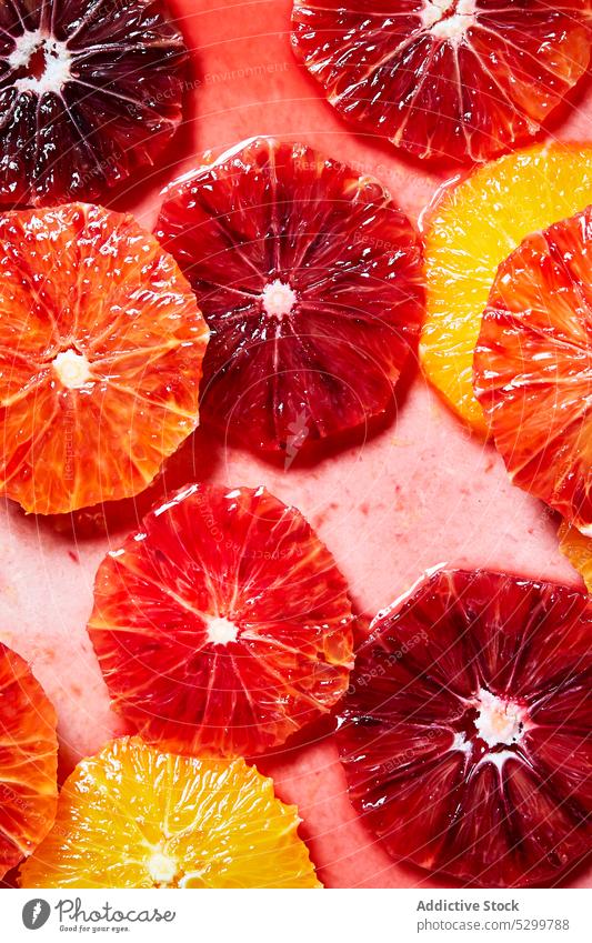 Slices of grapefruit and orange for cocktails preparation citrus slice fresh juice vitamin water background refreshment ingredient natural colorful bright
