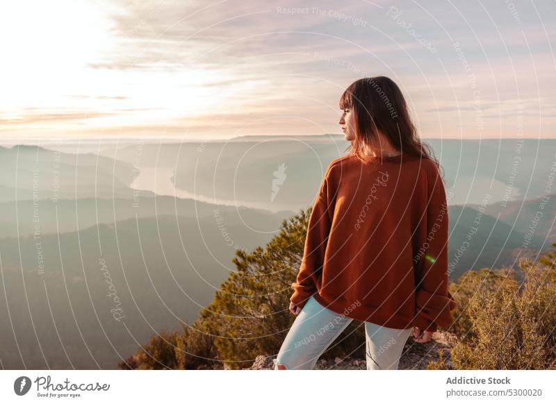 Woman admiring mountainous valley woman sunset traveler admire observe viewpoint highland landscape explore female picturesque sky vacation almatret catalonia