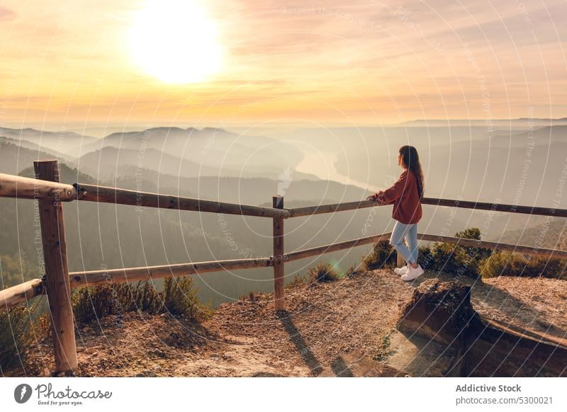 Woman admiring mountainous valley woman sunset traveler admire observe viewpoint highland landscape explore female picturesque sky vacation almatret catalonia