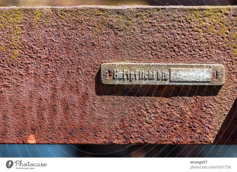 Liability until ??? liability Insurance sign Railroad car Framework rusty Old corroded Metal Rust Transience Detail Exterior shot Colour photo Close-up