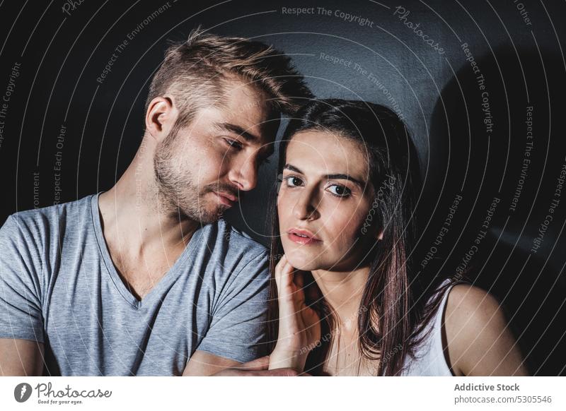 Couple posing in studio couple love together man woman relationship happy casual young style tender care gentle cheerful joy pleasure glad standing handsome