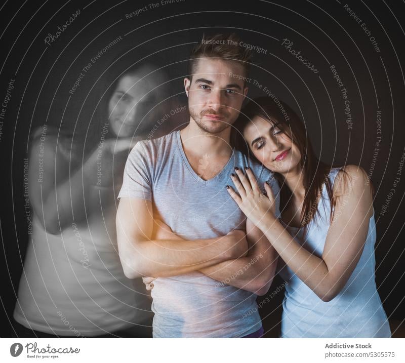 Couple embracing posing in studio couple relationship woman concept together boyfriend girlfriend love handsome attractive pretty beautiful lovely silhouette