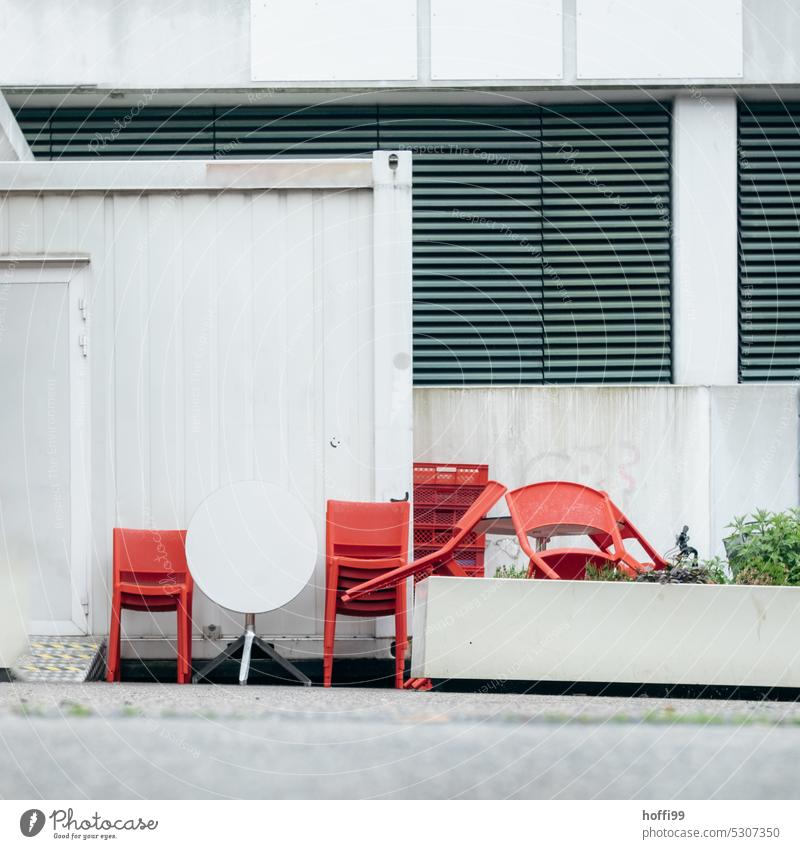 urban still life red chairs with white round table Still Life Red Chair Backyard Empty Seating Deserted Furniture Table Gastronomy Outdoor furniture Café Closed
