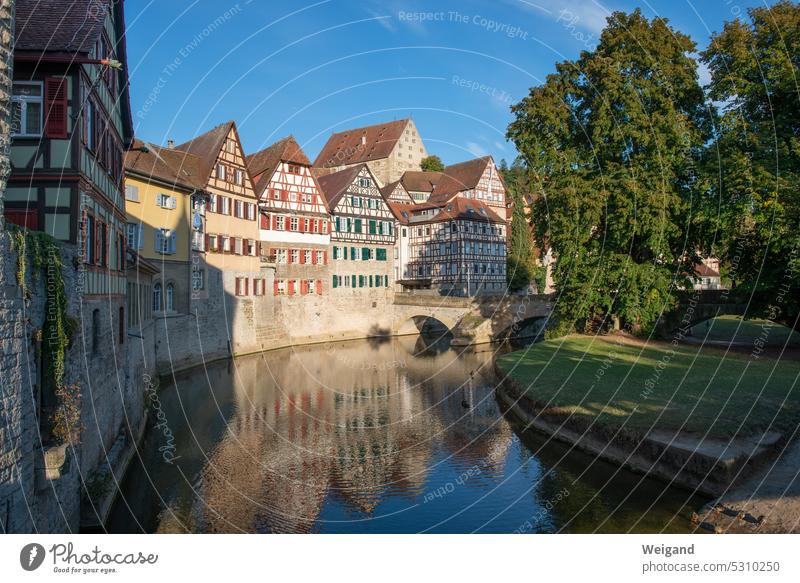 Half-timbered houses on the Kocher River in Schwäbisch Hall Baden Württemberg Hohenlohe Cooker reflection Trip Town medieval Tourism romantic Sunlight