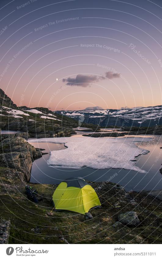 Tent by the lake in the mountains at night Lake Snow Ice rock Peak Sunset Sunrise Twilight Night Moon reflection neon Cold Hiking