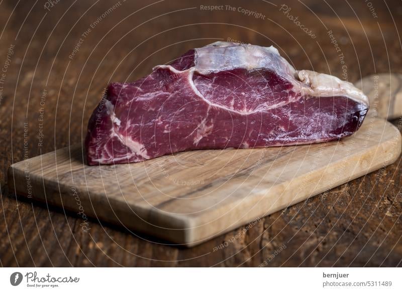 raw steak on a cutting board Raw Ribeye Meat Wood Barbecue (apparatus) Eating herbs Resources Beef Steak sirloin Rosemary angus seethed Salt beefsteak grilled