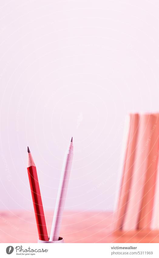 Pencils and books studio shot workplace pencils office business copy space leisure time red drawing tool school artistic education nobody businessman concepts