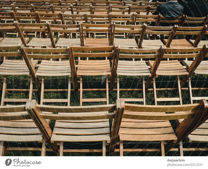 There are still free places for the open air concert. Seats Deserted Seating empty seats Exterior shot Chair Row Colour photo Seating capacity Empty