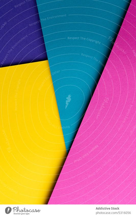 Arranged sheets of colorful carton layout blue pink purple yellow background tone blocking shade cardboard surface material design texture trend simple