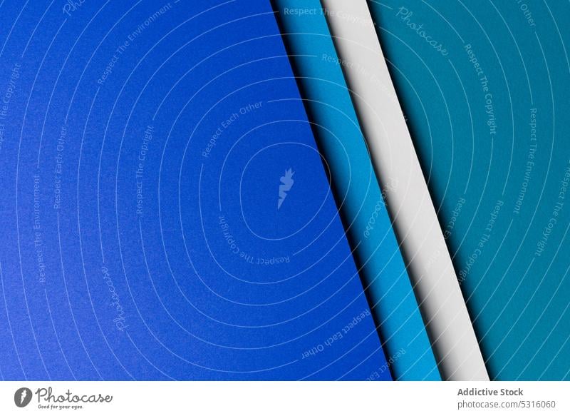 Arranged sheets of colorful carton layout blue white background tone blocking shade cardboard surface material design texture trend simple minimalist paper