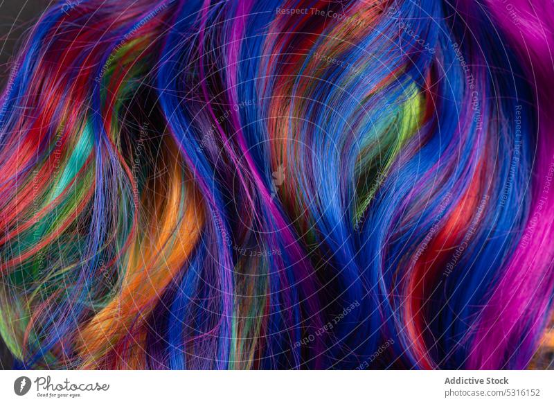 Background of vivid colored hair multicolored curl background style colorful dyed vogue fashion rainbow trendy minimalist spectrum vibrant soft lock texture