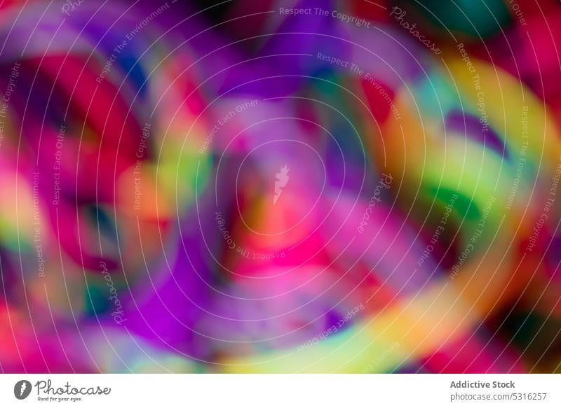Blurred multicolored lines in background vibrant blur abstract creative spectrum bright design style colorful art mess decoration element twine glow vivid loose