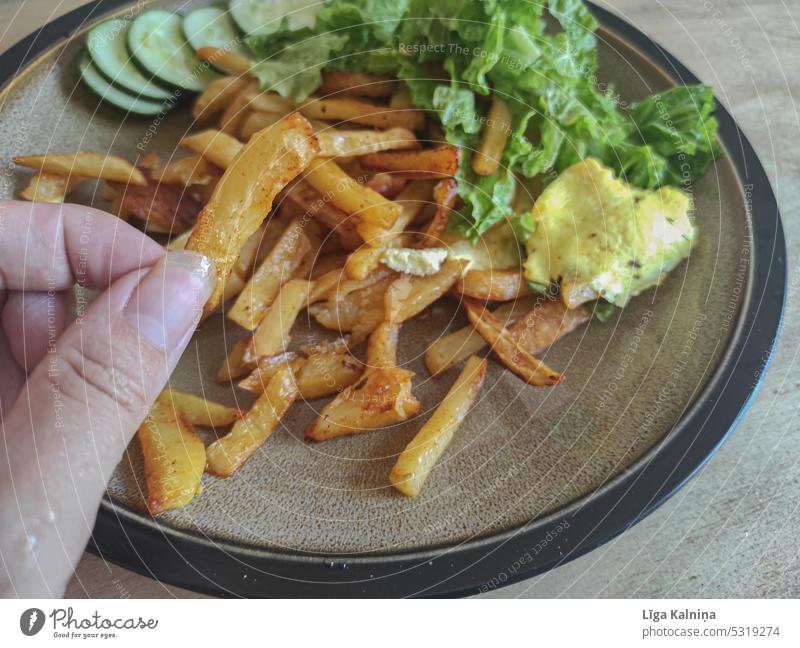 Homemade french fries with salad French fries homemade food Eating Unhealthy Food Finger food Snack Ketchup Appetite Nutrition Delicious Snack bar Fast food