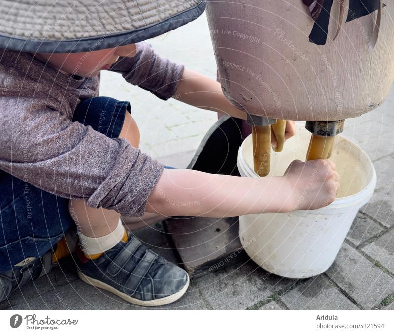 Child practicing milking on a dummy cow Milk Udder Mock-up Cow Practice try Bucket Teats Farm Concentrate Infancy Agriculture Animal vegan Unhealthy Healthy