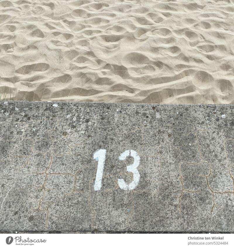 Beach section 13 Digits and numbers Sand Lanes & trails Copy Space top Signs and labeling Structures and shapes Pattern