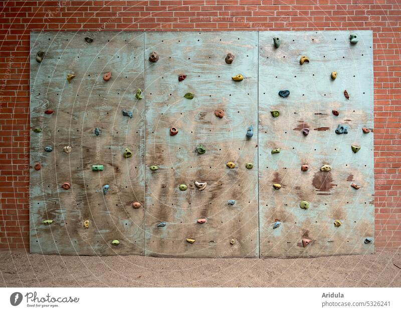 Climbing wall on brick wall handles climbing grips motley Wood Wood panels Bouldering Leisure and hobbies Sports Wall (building) Wall (barrier) Brick Brick wall