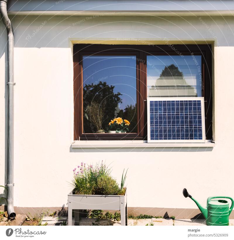 Solar panel on the window House solar windows raised Watering can Gutter downpipe House (Residential Structure) Energy Technology Window Solar collectors