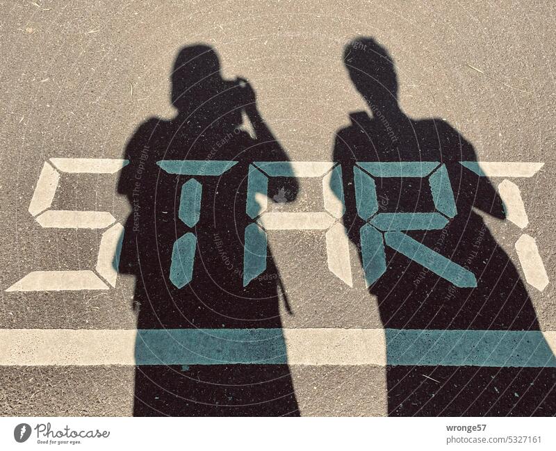 Start of the new week launch Colour photo Shadow play Shadow image Light Contrast Light and shadow Street Walkways Starting line Sports Sporting event