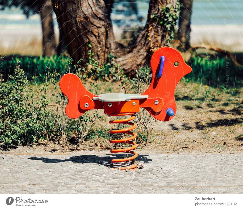 Spring rocker, red wooden animal for children to ride on steel spring, behind tree and beach game seesaw Movement Toys wood animal Red Playground Spiral Ride