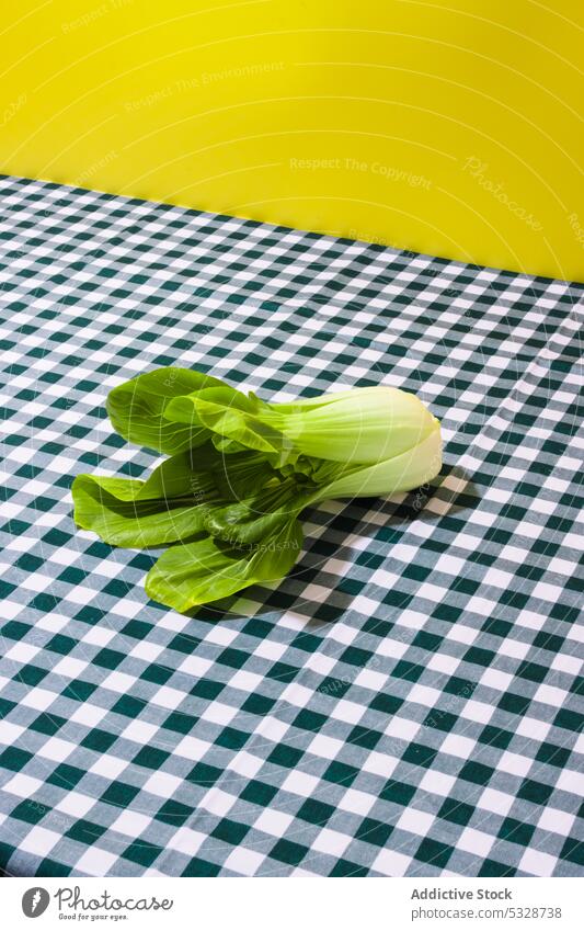 Bok choy cabbage on table bok choy fresh tablecloth food vegetable organic colorful healthy vegetarian diet natural ingredient checkered raw product harvest