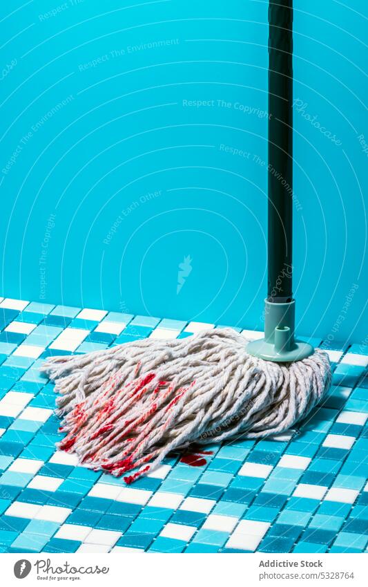 Mopping stick on floor with blood stains wash tile wall mop ceramic spill clean wipe plaster housework hygiene plastic mosaic droplet sanitary room sanitation