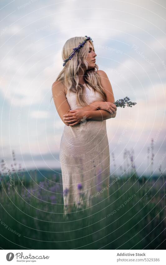 Woman standing in lavender field woman nature flower bloom blossom blond enjoy sunset floral meadow eyes closed summer female harmony dress relax sundown rest