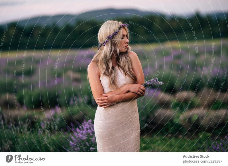 Woman standing in lavender field woman nature flower bloom blossom blond enjoy sunset floral meadow eyes closed summer female harmony dress relax sundown rest