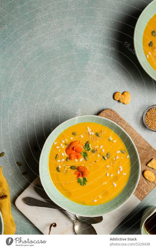 Tasty pumpkin cream soup with vegetables in bowls carrot vegetarian food lunch serve portion dish vegan meal delicious cuisine gourmet tasty herb healthy
