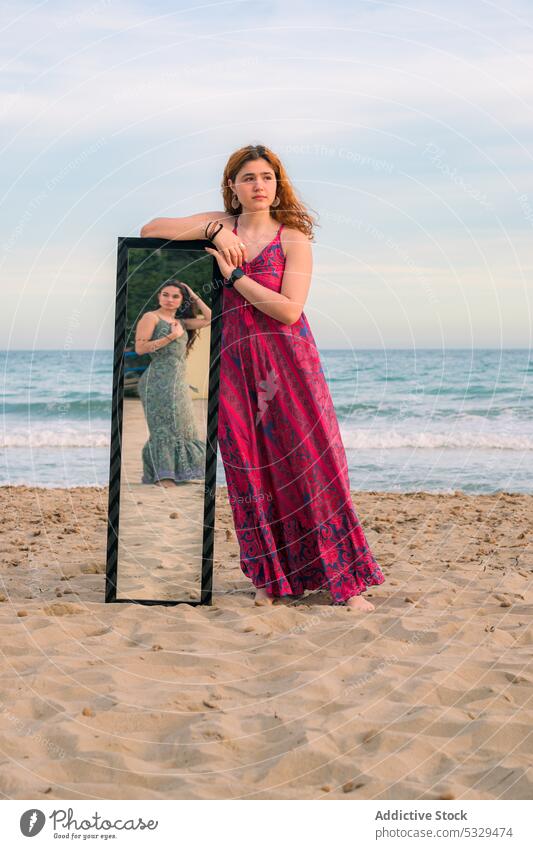 Woman in long dress with mirror on beach women sea girlfriend summer wave reflection outfit ocean relationship female young sand water feminine peaceful