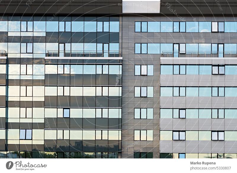 Windows on modern business building construction windows office pattern architecture urban design facade structure corporation glass geometric exterior offices