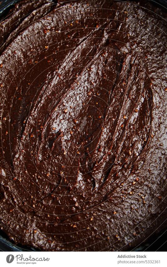 Dark chocolate cake batter surface raw sweet pastry delicious uncooked food tasty prepare ingredient recipe handmade cuisine fresh appetizing candy serve sugary